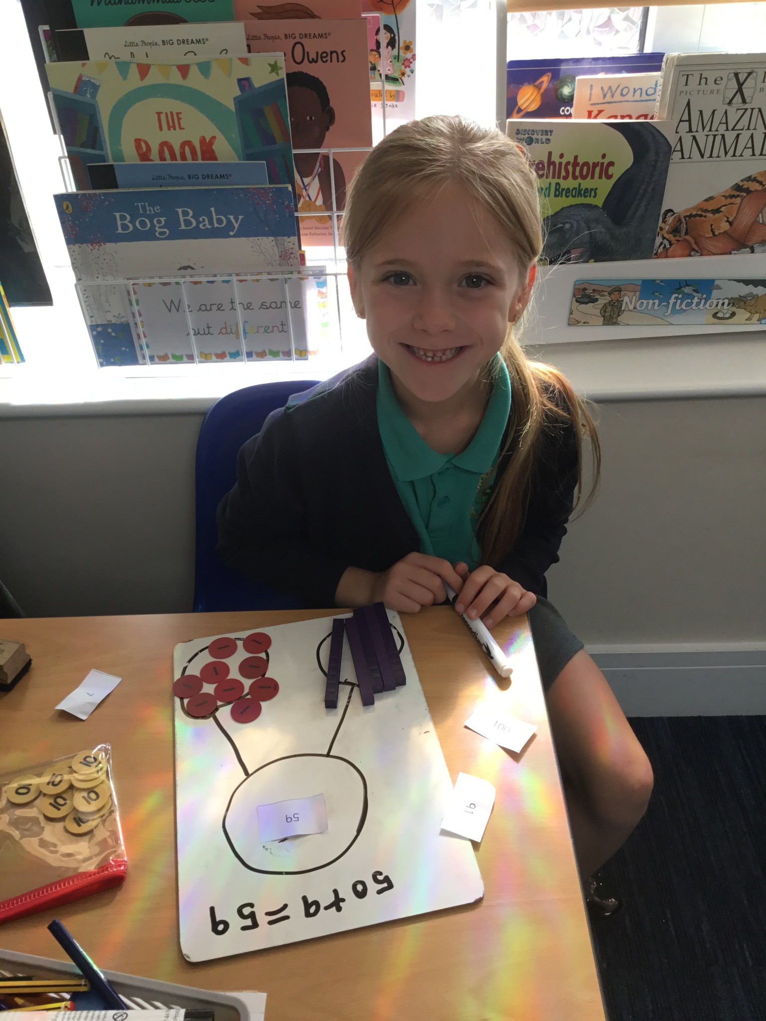 In maths we have been learning to partition 2-digit numbers. 