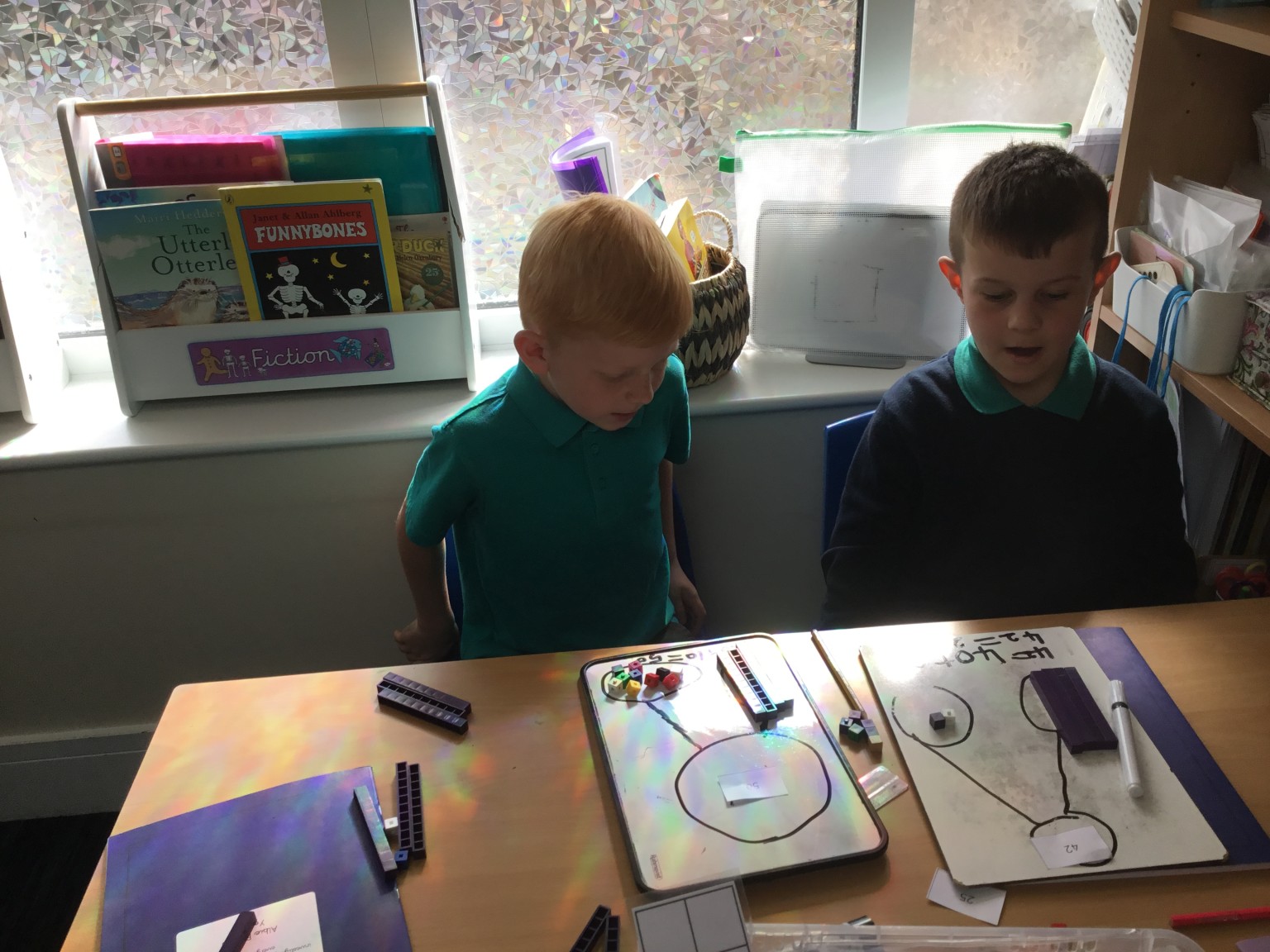 In maths we have been learning to partition 2-digit numbers. 