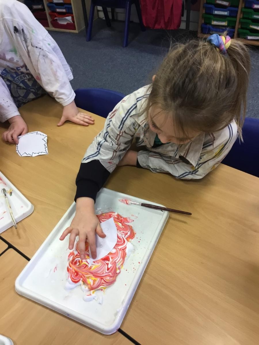 We were so excited about our autumn leaves! We pressed our leaf cut outs on to shaving foam and paint to create our marble effect. We love them!