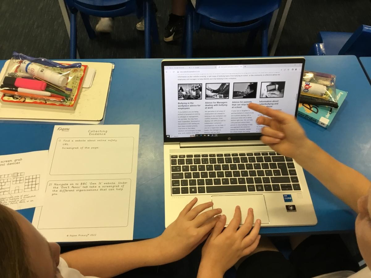 Children learning how to capture information online.
