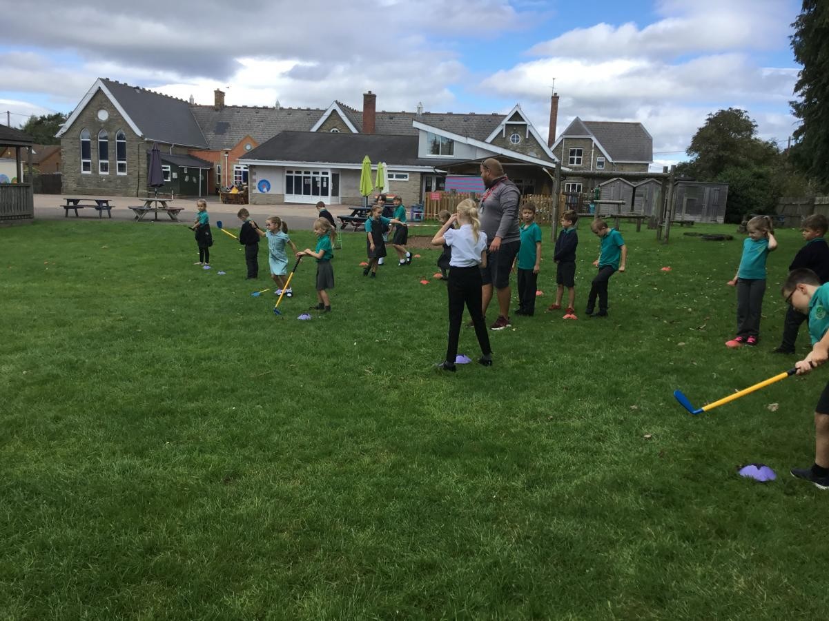 Beech class trying out golf