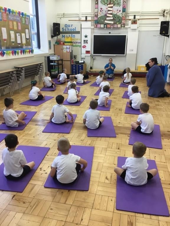 Oak class enjoy weekly yoga sessions