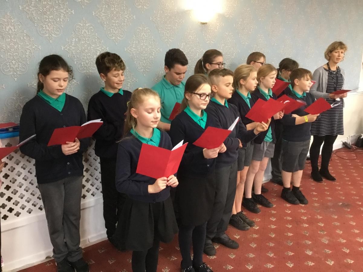 Carol singing at The Elms