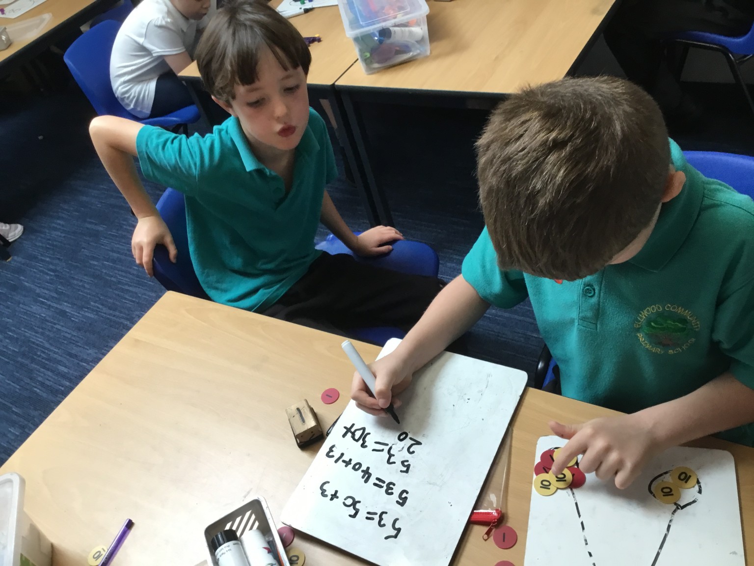 In maths we have been learning to partition 2-digit numbers. 