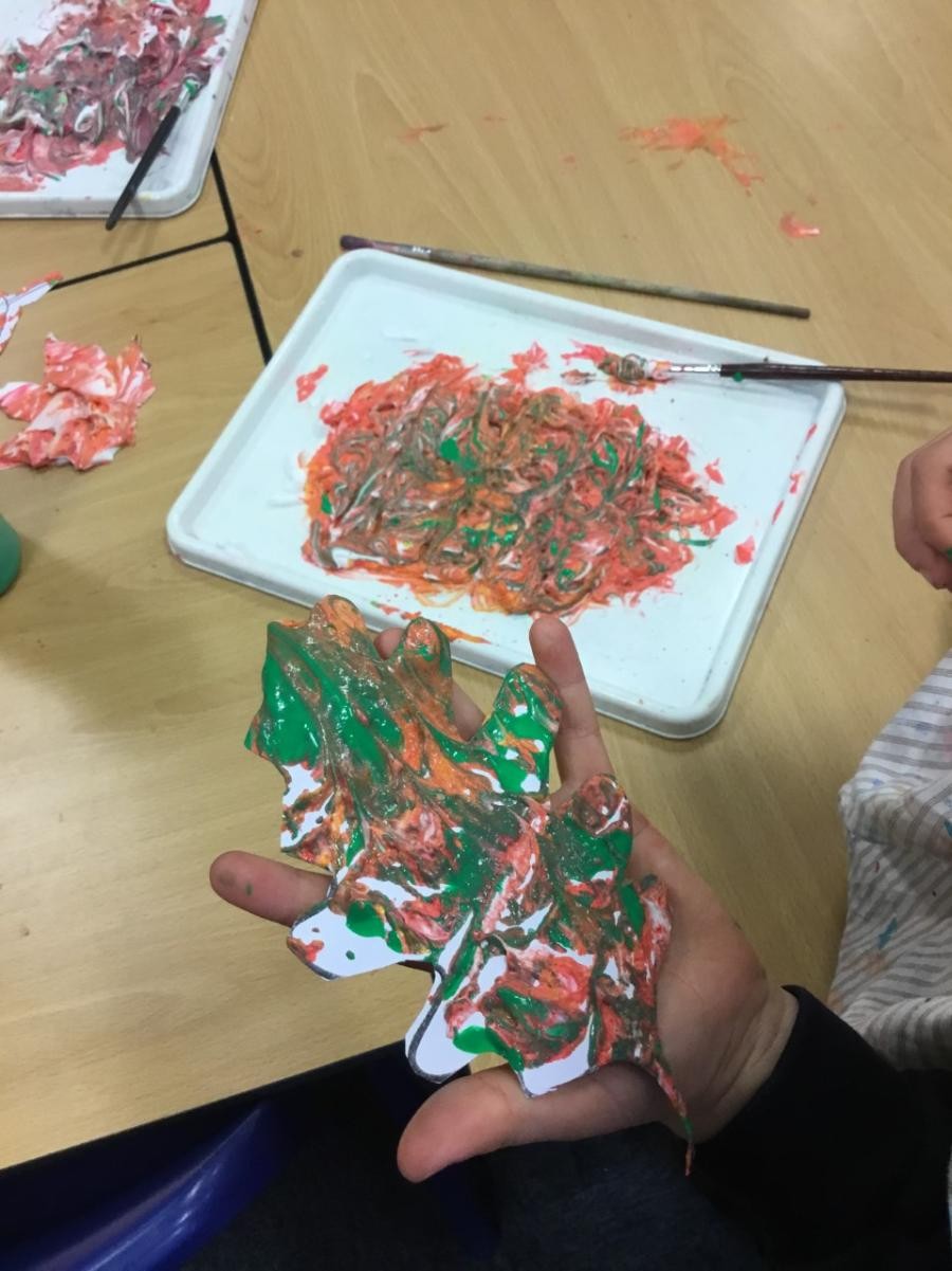 We were so excited about our autumn leaves! We pressed our leaf cut outs on to shaving foam and paint to create our marble effect. We love them!