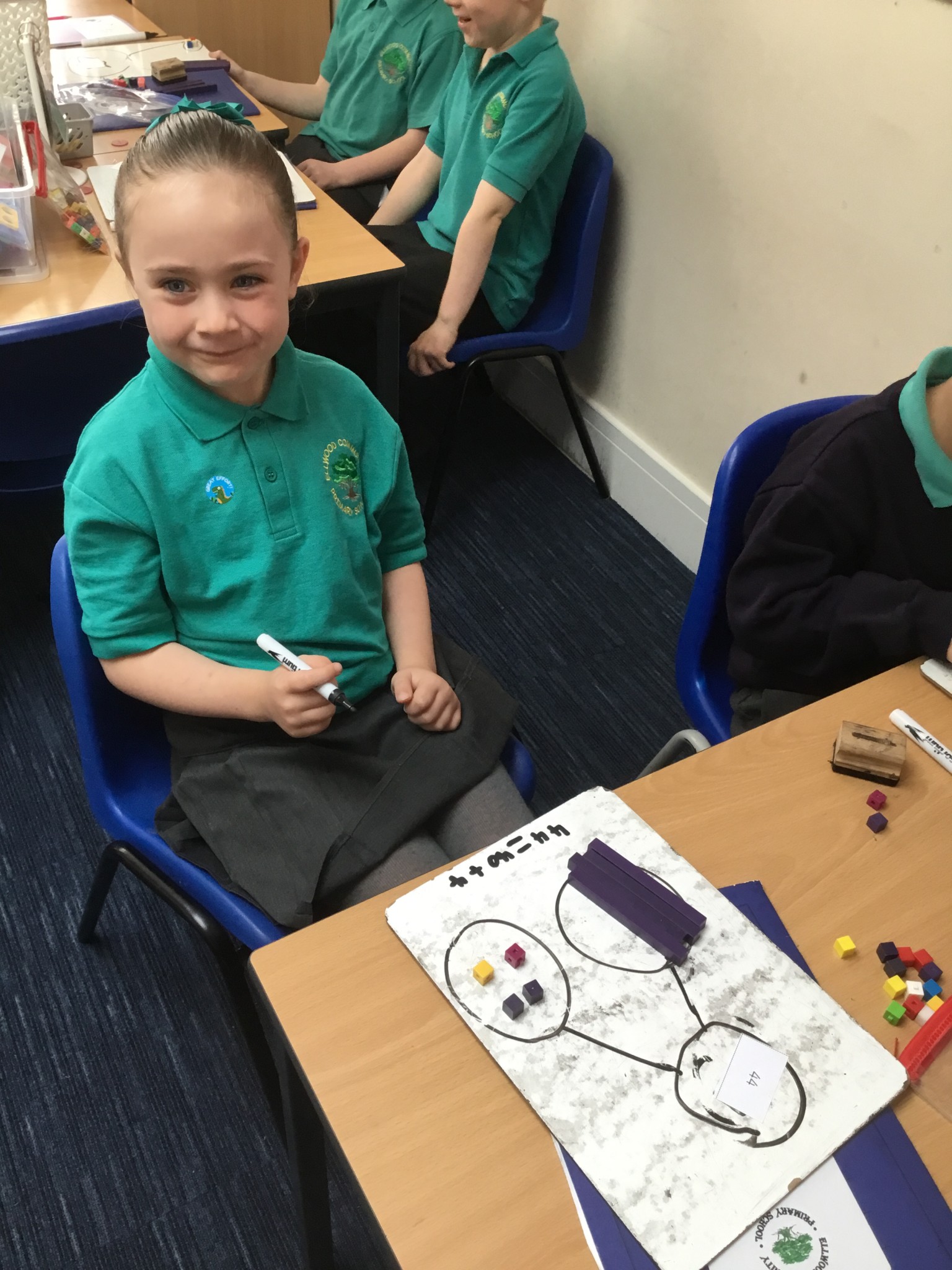 In maths we have been learning to partition 2-digit numbers. 