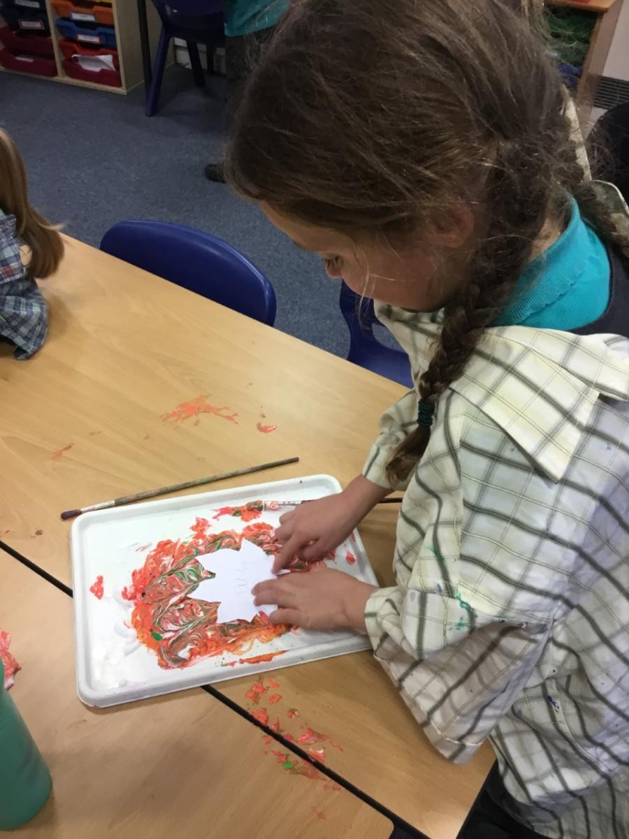 We were so excited about our autumn leaves! We pressed our leaf cut outs on to shaving foam and paint to create our marble effect. We love them!