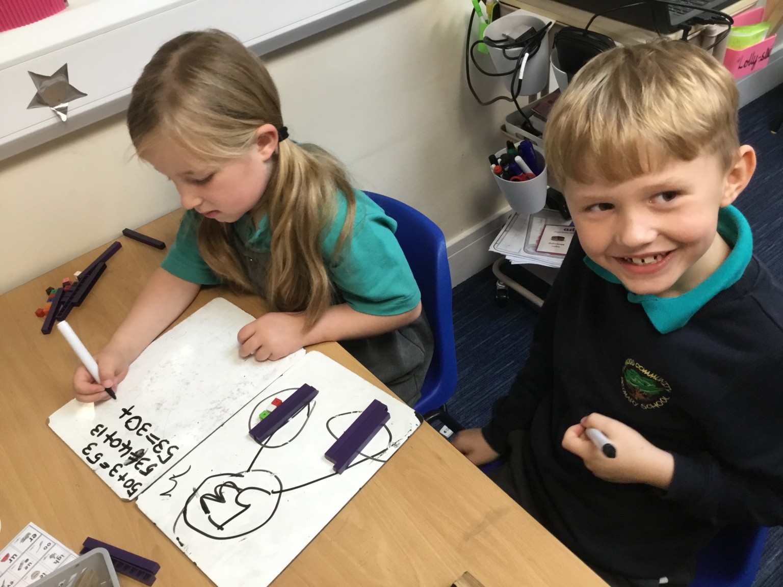 In maths we have been learning to partition 2-digit numbers. 