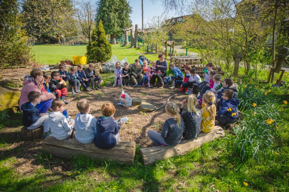 Spending time together reflecting in the log circle.