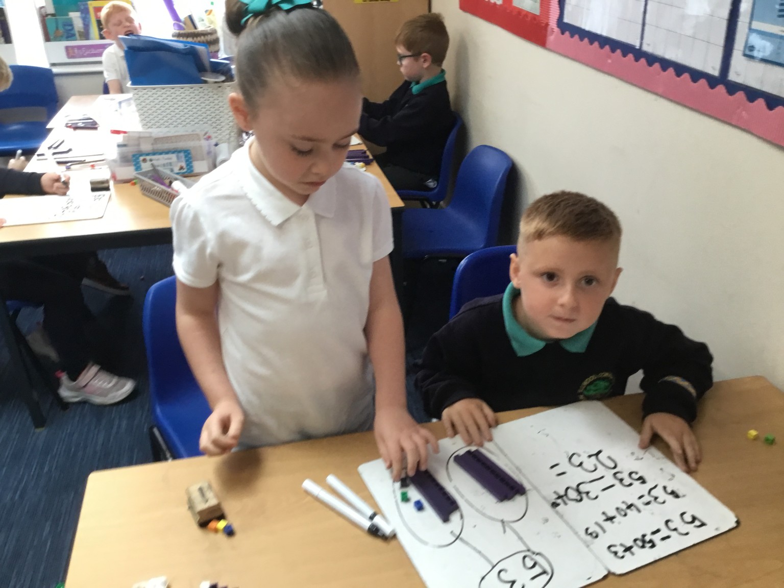 In maths we have been learning to partition 2-digit numbers. 