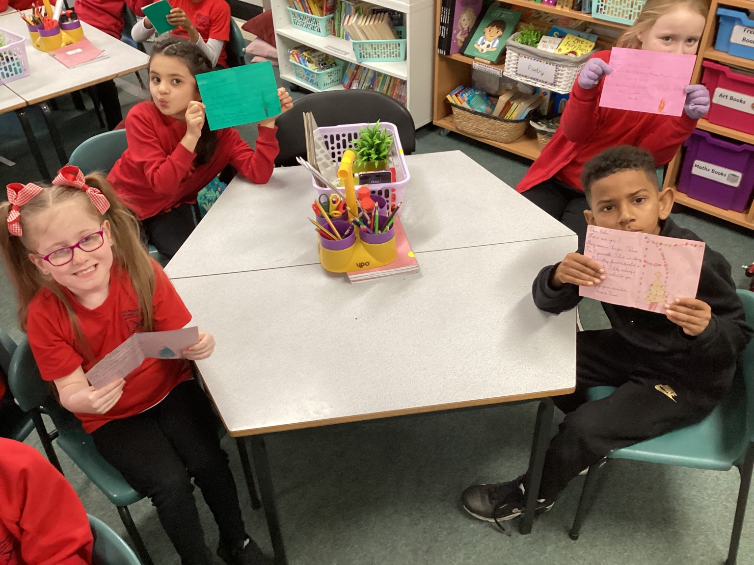 Children in Y3 opening their cards