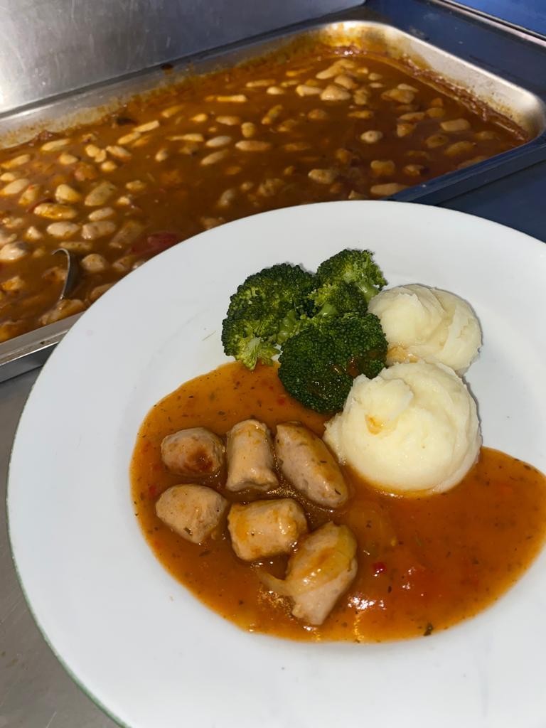 Sausage casserole with mashed potato and vegetables