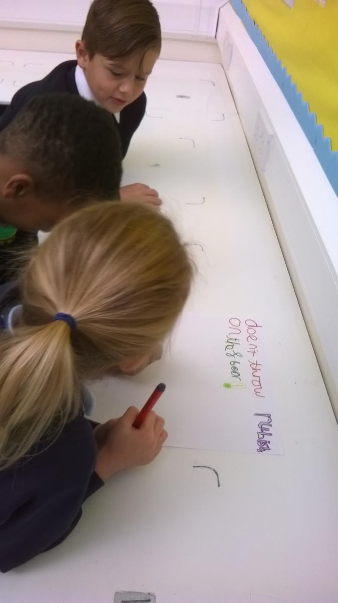 Our School Councillors creating litter posters as part of their first project. 