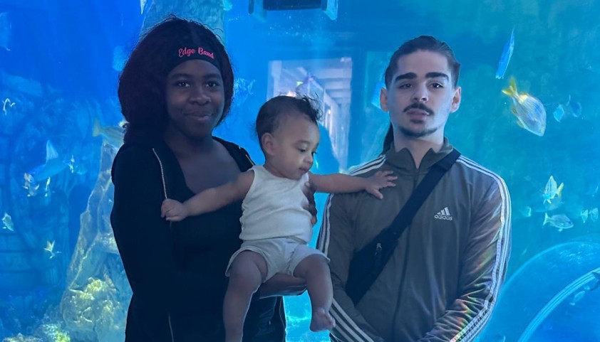 A young family on a group trip