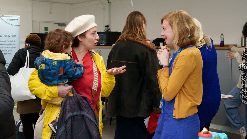 Parent talks to a member of staff