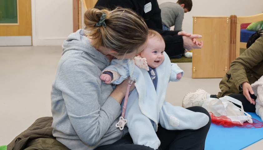 Mother and baby playing
