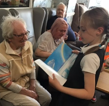 At the care home, where we read stories and played board games. 