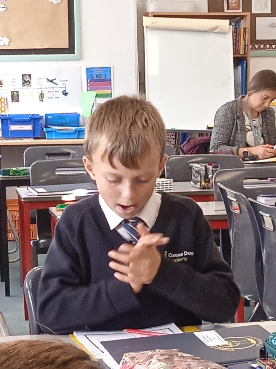 Clapping syllables to read tricky words