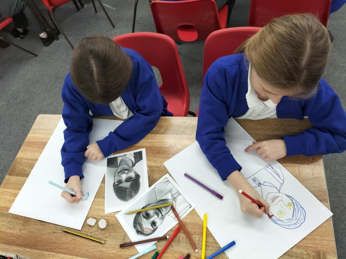 Art Club have been producing self portraits in the style of Andy Warhol.