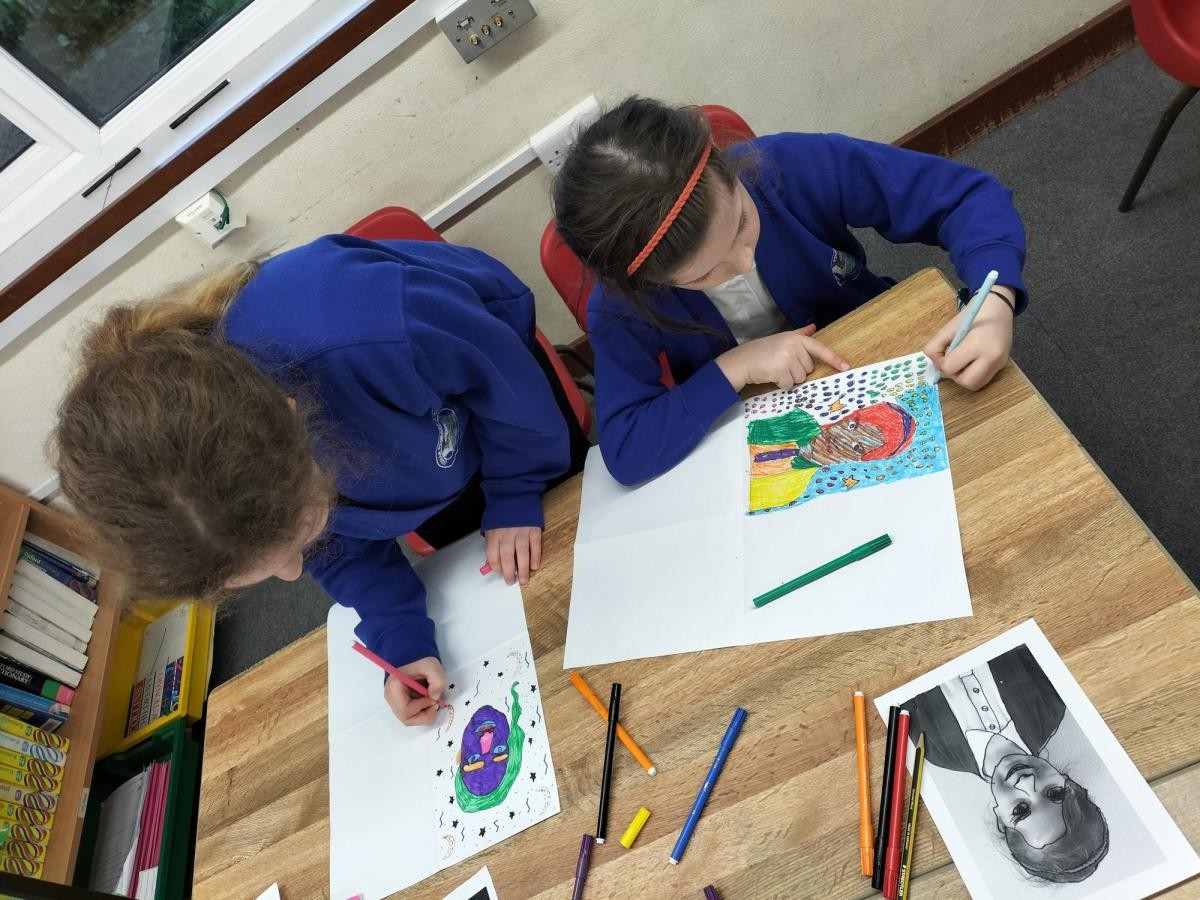 Art Club have been producing self portraits in the style of Andy Warhol.