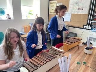 Crenver working on skills of rhythm and instrumental skills.