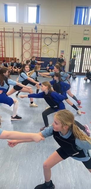 Crenver learning the new sport of fencing. 