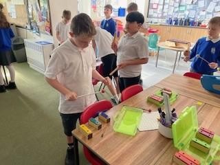 Crenver working on skills of rhythm and instrumental skills.