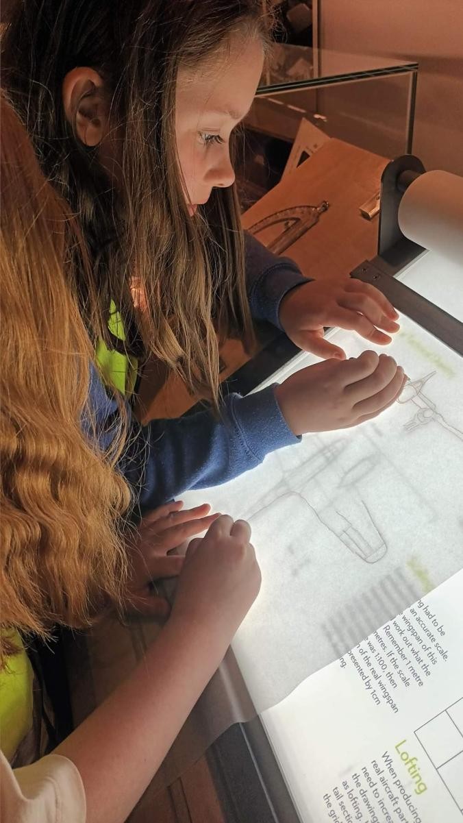 Reading with a lightbox on our Bristol Camp.