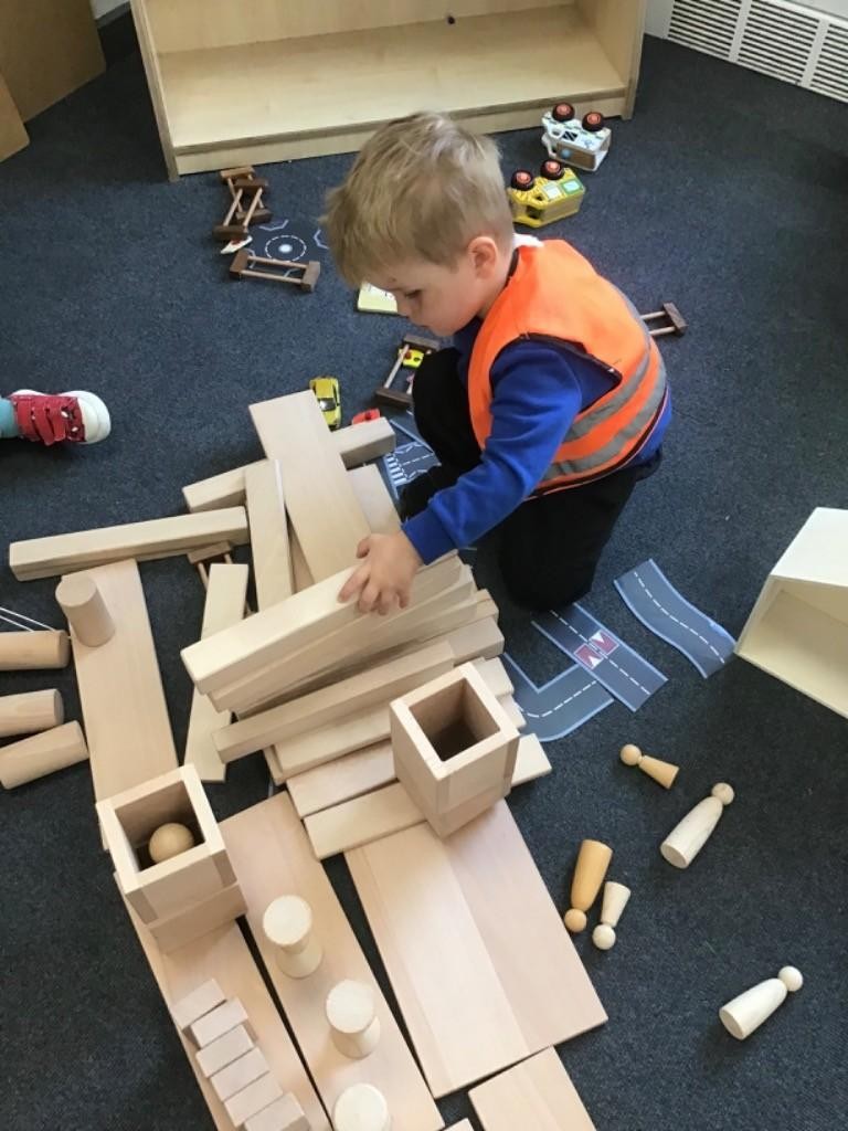 Vocabulary and understanding are developed through talk during continuous provision.