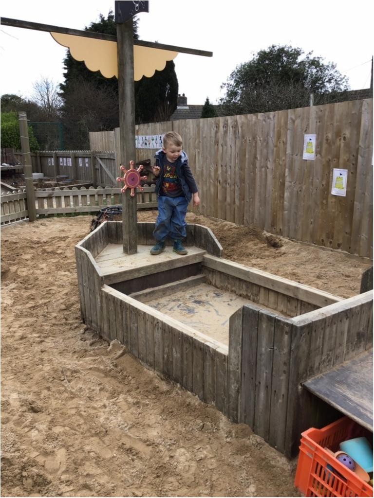 We have a huge sandpit where we can dig, build and take part in imaginary play!