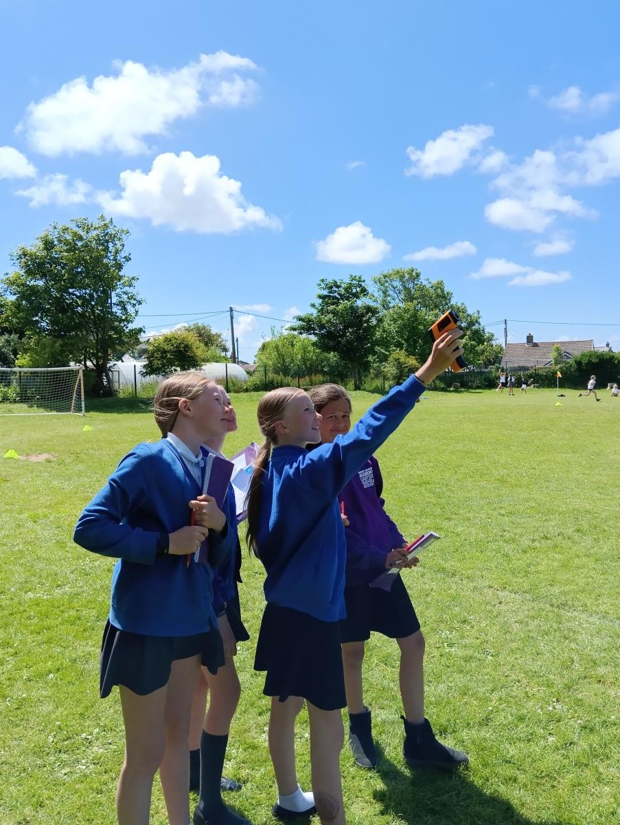 Using an infrared thermometer to measure cloud temperature to calculate their height.
