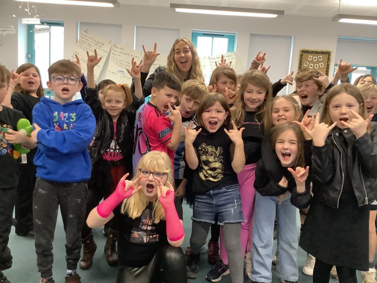 Dressing up as Rockstars for the day to raise money for the NSPCC