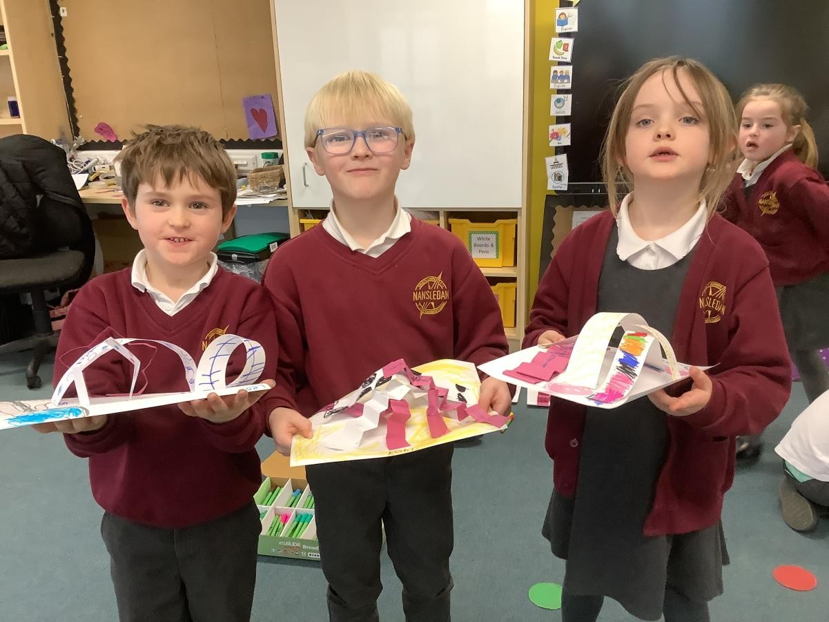 Making sculptures from paper in art.