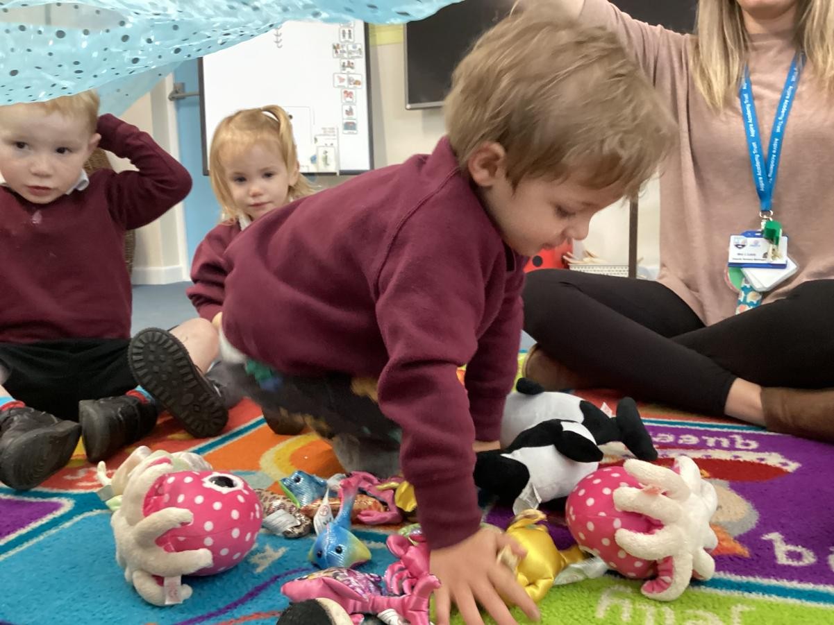 Enjoying our circle time games.