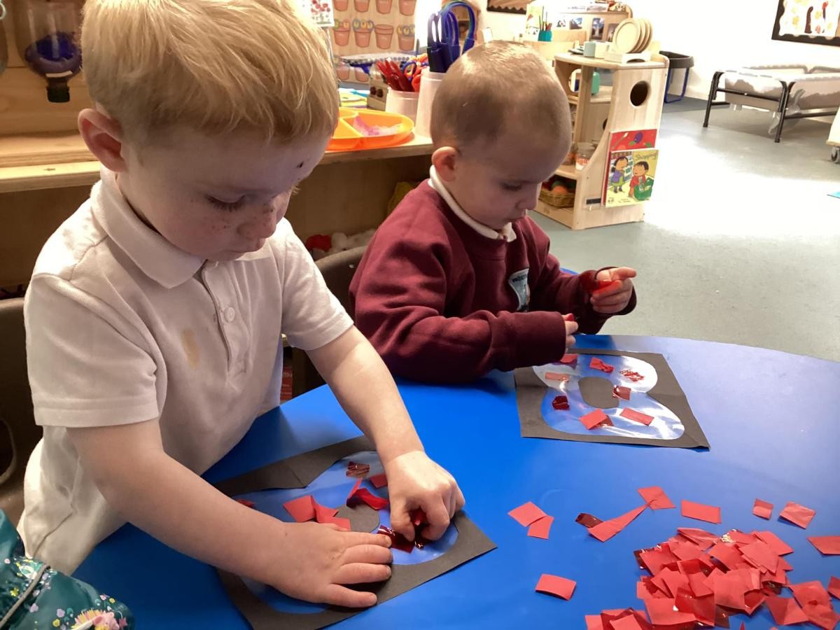 Decorating poppies for Remembrance Day