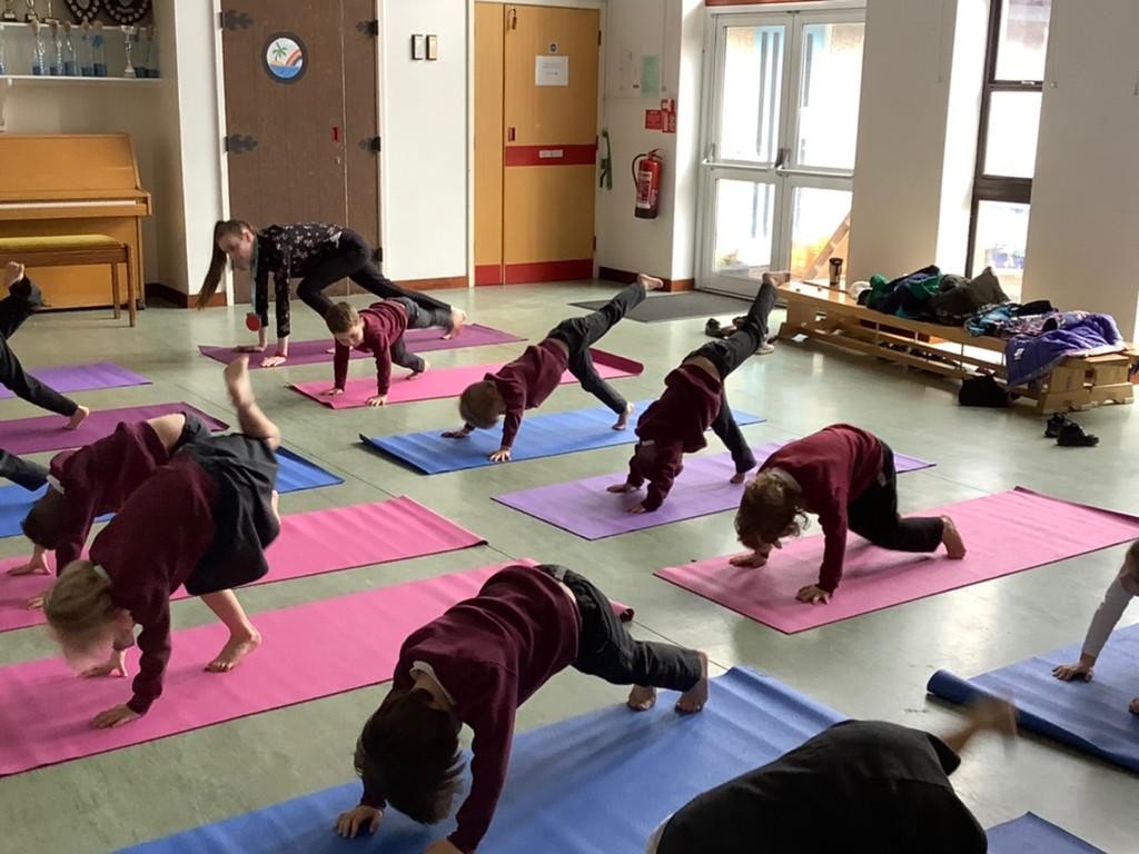 Exploring The Hungry Caterpillar story through yoga