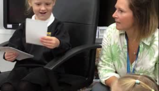 The children love to share photographs of the special people in their lives.