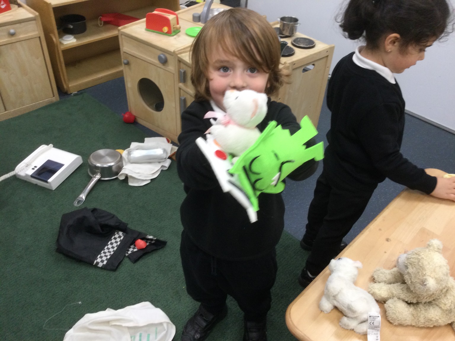 Retelling the Colour Monster Story using puppets.