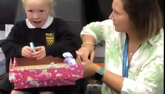 We share our boxes in front of the rest of the class or a small group.