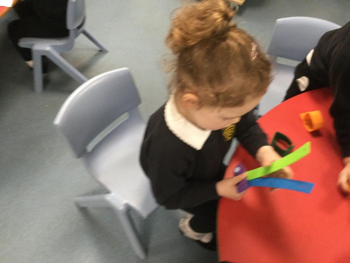 Funky Fingers button holes to work toward independence.