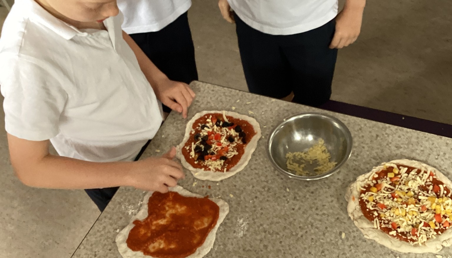 Pupils added their chosen toppings