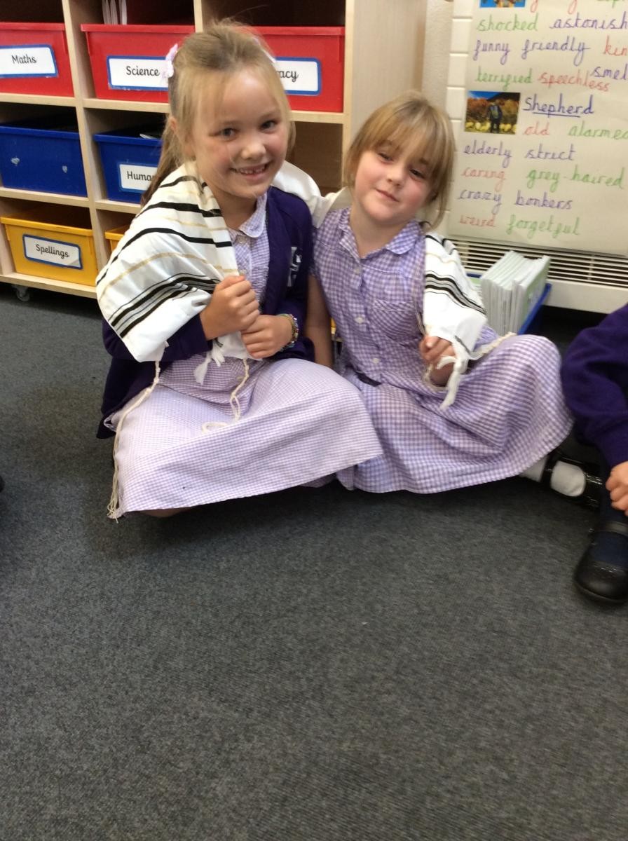Year 2 observing Jewish artefacts.