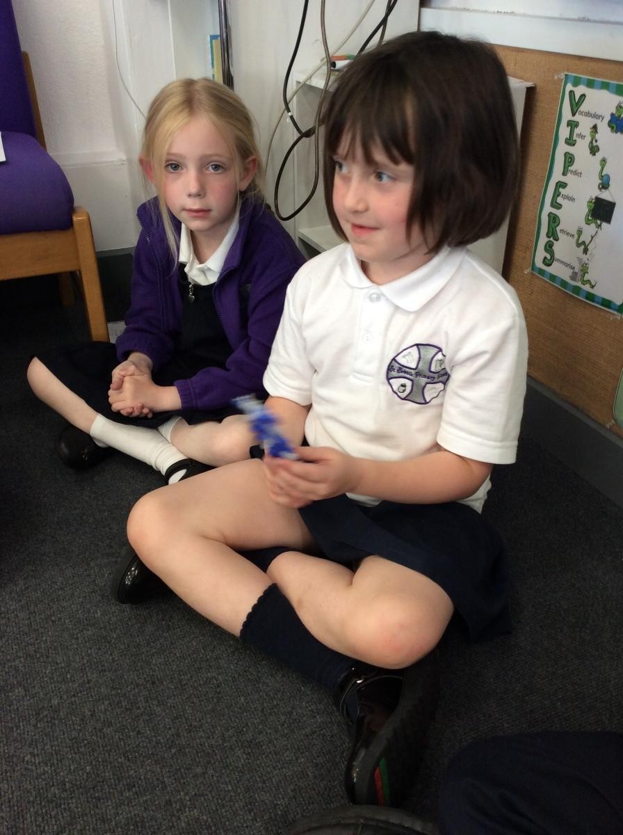Year 2 observing Jewish artefacts.