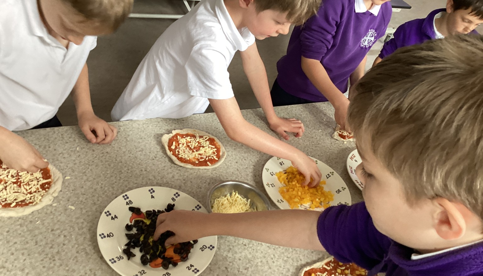 Pupils added their chosen toppings