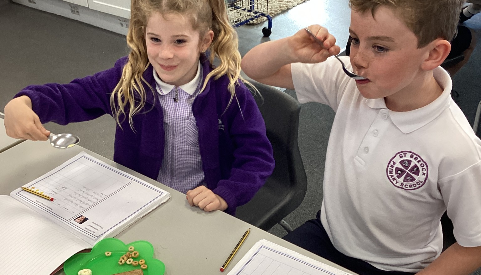 Pupils evaluated a range of existing food products such as bread, cereals, and butter, examining packaging and exploring taste, smell, appearance, and texture to understand what makes a successful product.