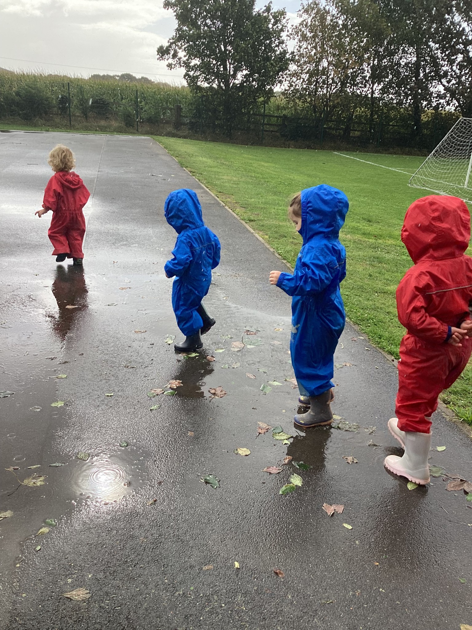 Exploring our school grounds, searching for muddy puddles!