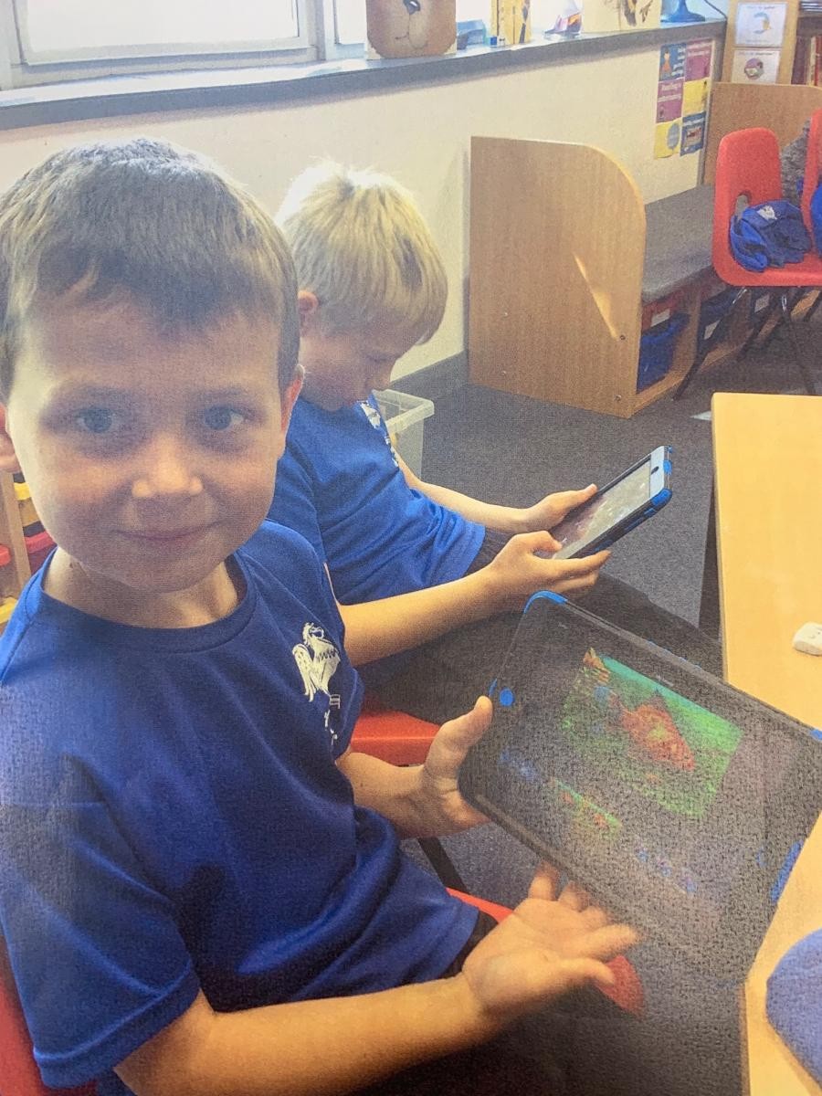 Class 3 using iMovie on iPads to produce Creation story videos in RE.