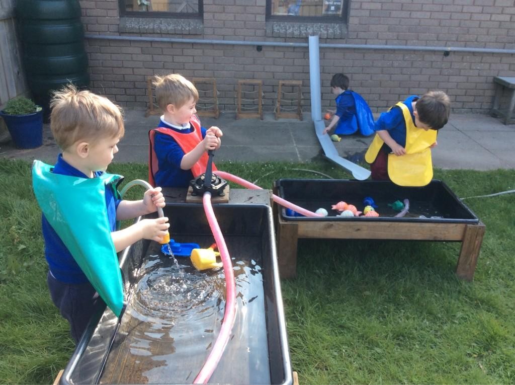 Water play! Children explore how things work!