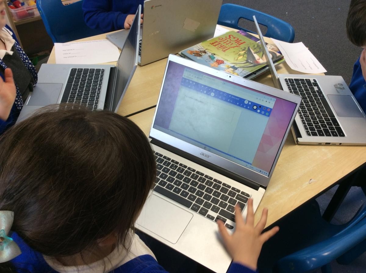 Using a keyboard to type and edit text.