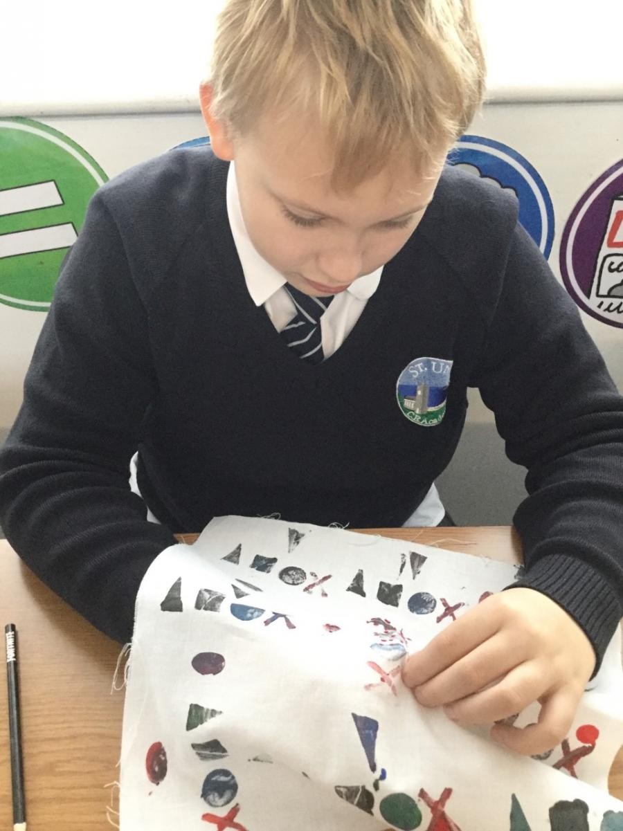 Textiles. Adding stitching and embellishments onto our fabric prints